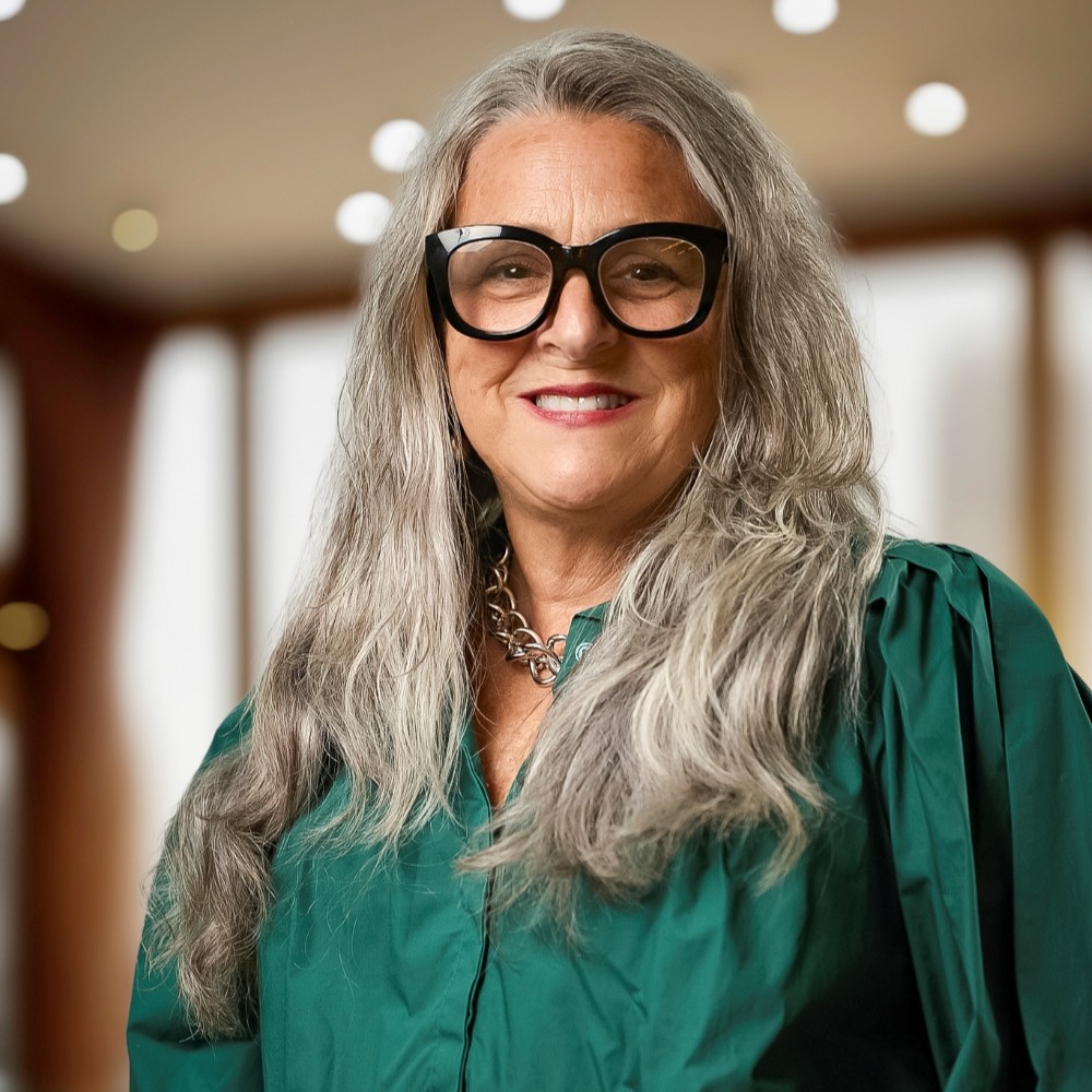 A headshot of Lori Eison Howard.