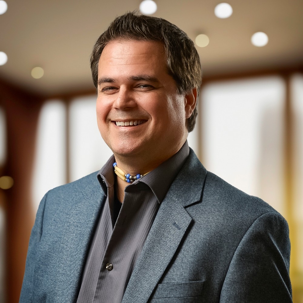 A headshot of Ben H. Rome.